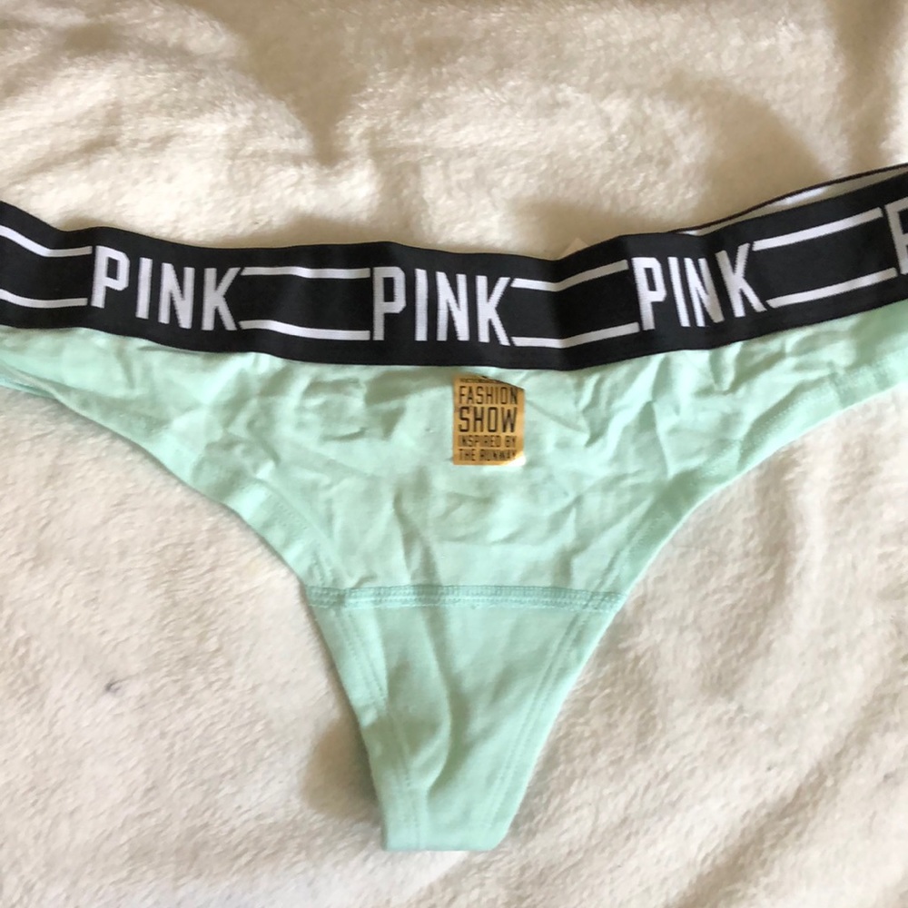 NWT PINK fashion show thong size L slight imperfections near sticker see pics
